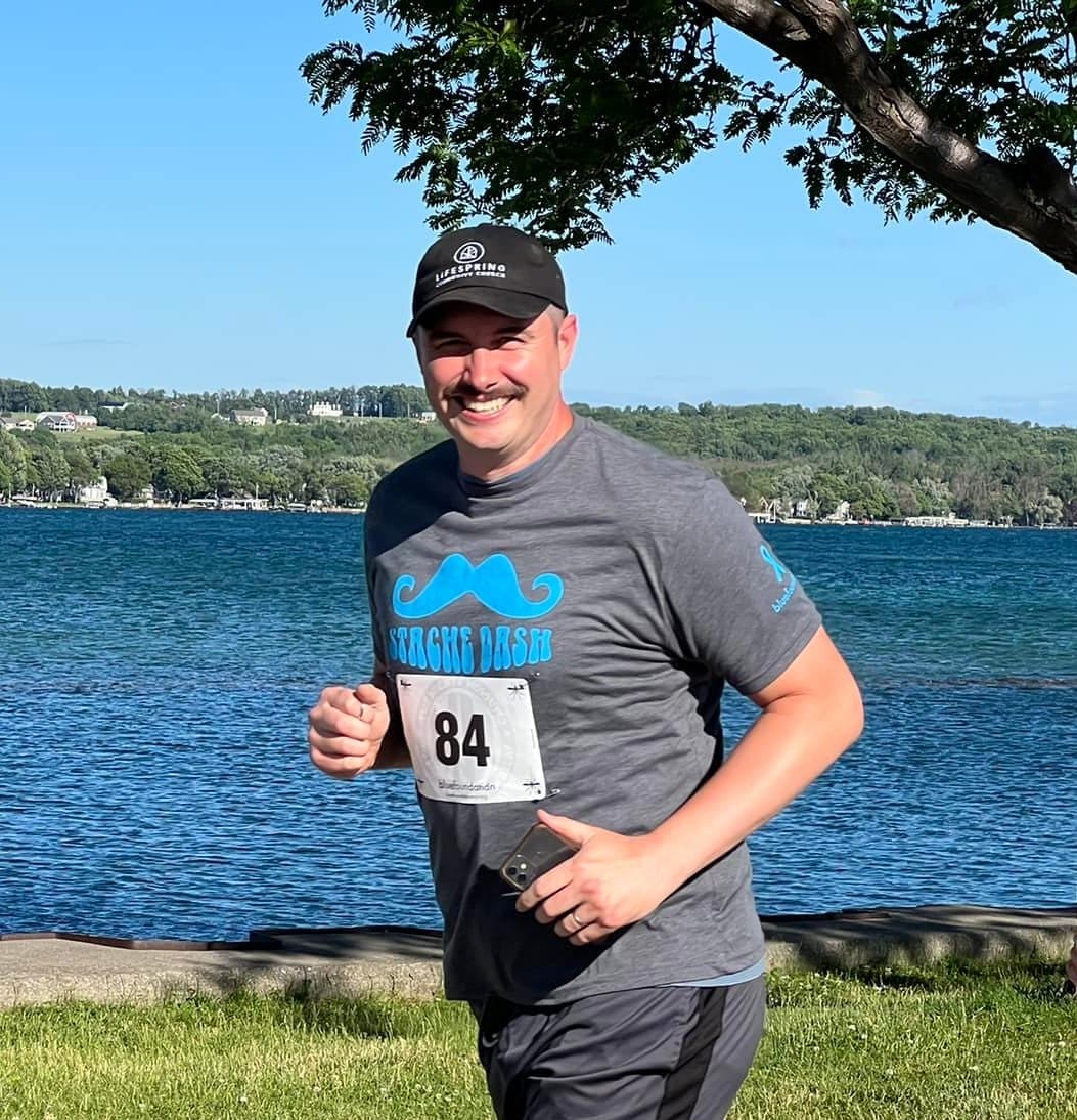 Pastor Bill running in the stache dash (2022).